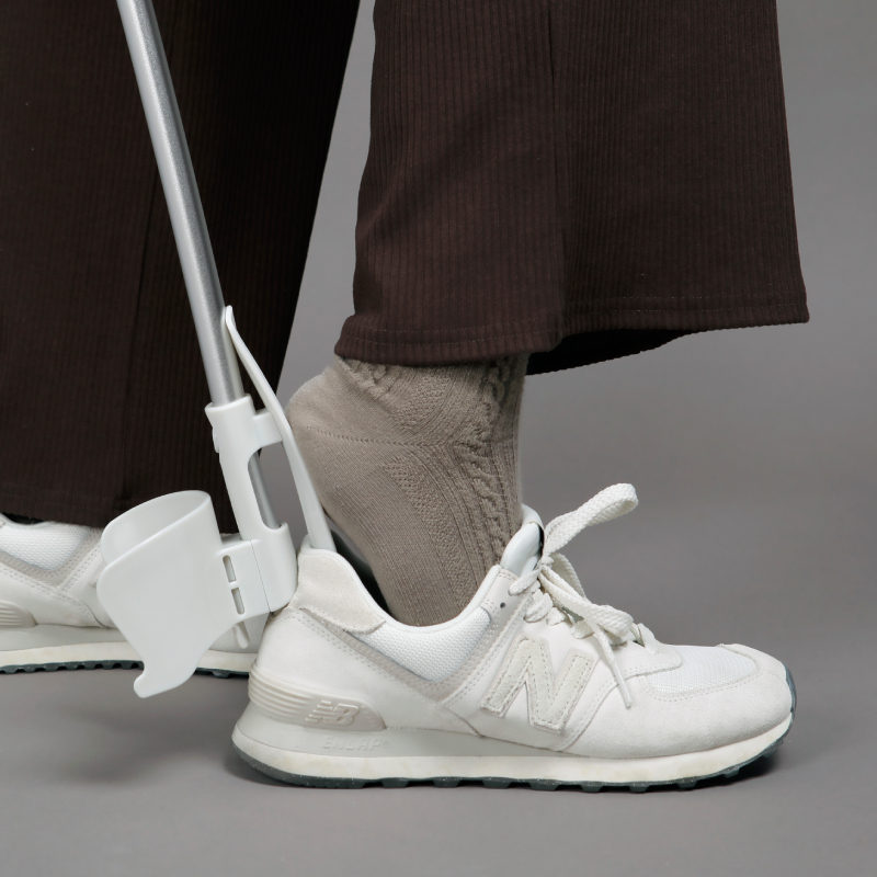 Putting Shoes On Standing