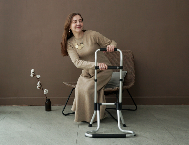 AH17 positioned next to different seating furniture